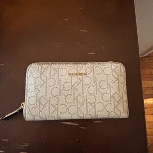 Calvin Klein Cream Monogram Zip Wallet
